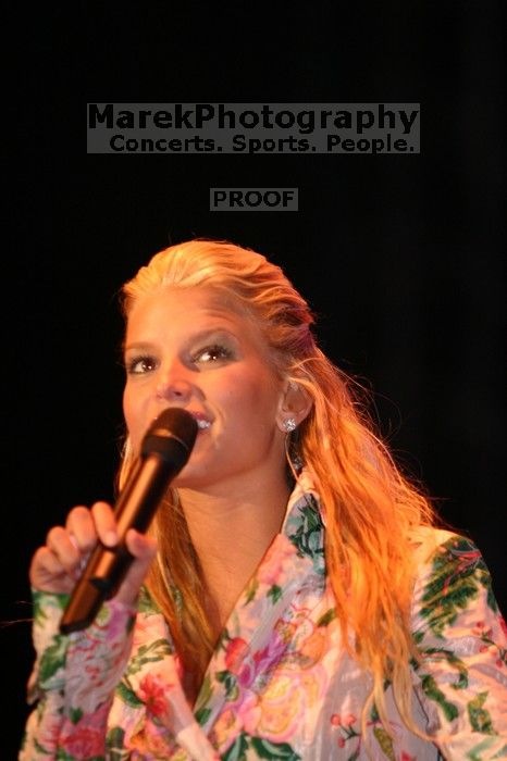 Jessica Simpson performs on the third day of Music Midtown, 2004.

Filename: IMG_7274.jpg
Aperture: f/2.8
Shutter Speed: 1/250
Body: Canon EOS DIGITAL REBEL
Lens: Canon EF 80-200mm f/2.8 L