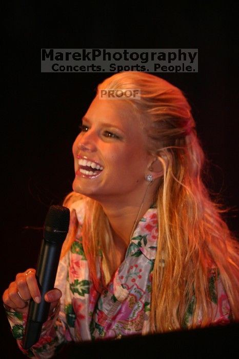 Jessica Simpson performs on the third day of Music Midtown, 2004.

Filename: IMG_7275.jpg
Aperture: f/2.8
Shutter Speed: 1/250
Body: Canon EOS DIGITAL REBEL
Lens: Canon EF 80-200mm f/2.8 L