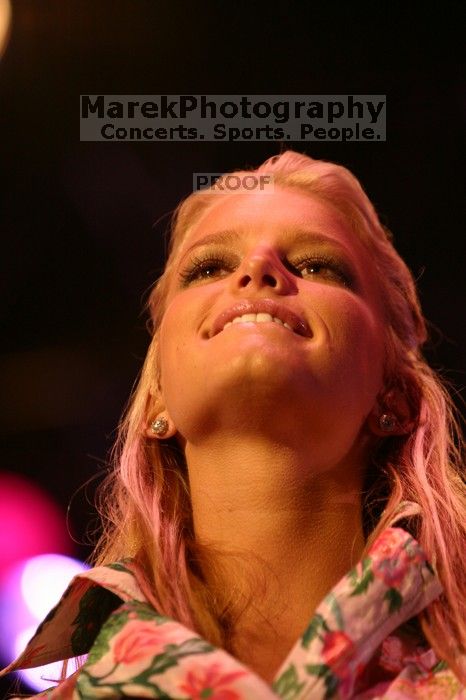 Jessica Simpson performs on the third day of Music Midtown, 2004.

Filename: IMG_7362.jpg
Aperture: f/2.8
Shutter Speed: 1/250
Body: Canon EOS DIGITAL REBEL
Lens: Canon EF 80-200mm f/2.8 L