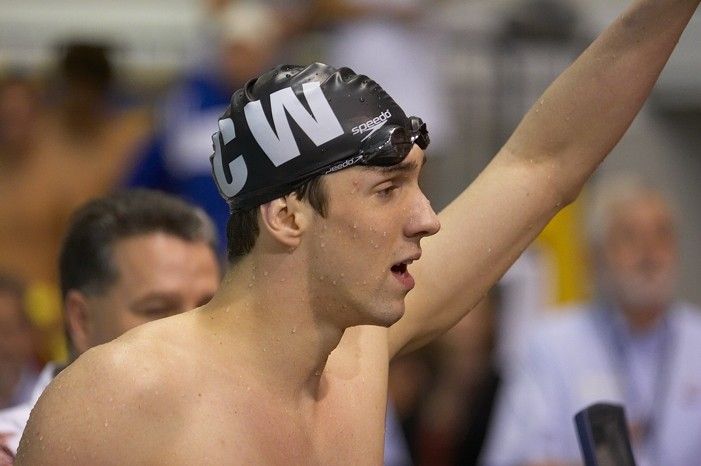 Michael Phelps of the University of Michigan Swim Team placed 1st in the last heat of the 200 IM Finals with a record time of 1:41.30, beating the old record of 1:41.71 at the Speedo American Short Course Championships.

Filename: SRM_20060304_192610_2.jpg
Aperture: f/2.8
Shutter Speed: 1/640
Body: Canon EOS 20D
Lens: Canon EF 80-200mm f/2.8 L