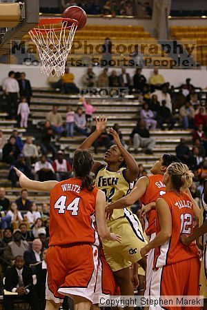 The Georgia Tech women's basketball team played Clemson.

Filename: img_0669_std.jpg
Aperture: f/2.8
Shutter Speed: 1/320
Body: Canon EOS DIGITAL REBEL
Lens: Canon EF 80-200mm f/2.8 L