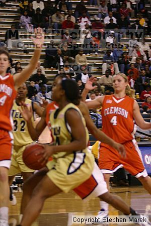 The Georgia Tech women's basketball team played Clemson.

Filename: img_0706_std.jpg
Aperture: f/2.8
Shutter Speed: 1/320
Body: Canon EOS DIGITAL REBEL
Lens: Canon EF 80-200mm f/2.8 L