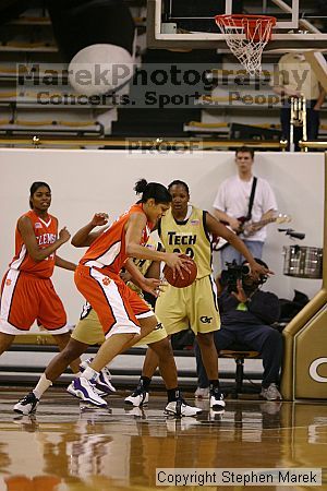 The Georgia Tech women's basketball team played Clemson.

Filename: img_0742_std.jpg
Aperture: f/2.8
Shutter Speed: 1/320
Body: Canon EOS DIGITAL REBEL
Lens: Canon EF 80-200mm f/2.8 L