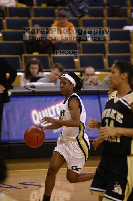 The Georgia Tech women's basketball team played Wake Forest.

Filename: IMG_1115.jpg
Aperture: f/2.8
Shutter Speed: 1/320
Body: Canon EOS DIGITAL REBEL
Lens: Canon EF 80-200mm f/2.8 L