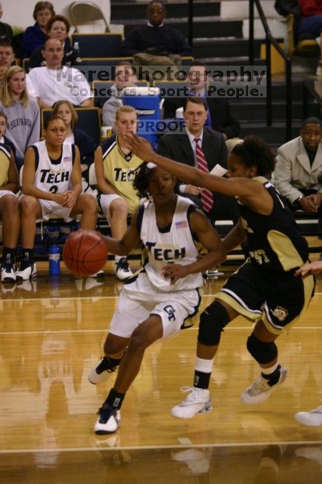 The Georgia Tech women's basketball team played Wake Forest.

Filename: IMG_1156.jpg
Aperture: f/2.8
Shutter Speed: 1/320
Body: Canon EOS DIGITAL REBEL
Lens: Canon EF 80-200mm f/2.8 L