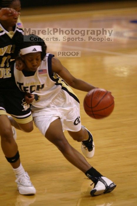 The Georgia Tech women's basketball team played Wake Forest.

Filename: IMG_1173.jpg
Aperture: f/2.8
Shutter Speed: 1/320
Body: Canon EOS DIGITAL REBEL
Lens: Canon EF 80-200mm f/2.8 L