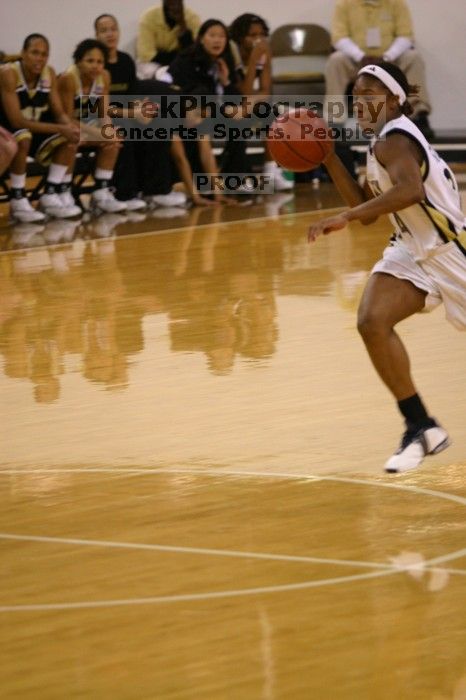 The Georgia Tech women's basketball team played Wake Forest.

Filename: IMG_1142.jpg
Aperture: f/2.8
Shutter Speed: 1/320
Body: Canon EOS DIGITAL REBEL
Lens: Canon EF 80-200mm f/2.8 L