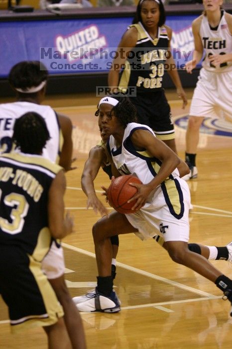 The Georgia Tech women's basketball team played Wake Forest.

Filename: IMG_1162.jpg
Aperture: f/2.8
Shutter Speed: 1/320
Body: Canon EOS DIGITAL REBEL
Lens: Canon EF 80-200mm f/2.8 L