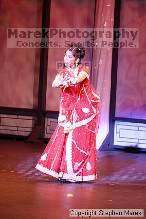 Miss Asian Atlanta pageant, 2004.

Filename: img_0832_std.jpg
Aperture: f/2.8
Shutter Speed: 1/125
Body: Canon EOS DIGITAL REBEL
Lens: Canon EF 80-200mm f/2.8 L