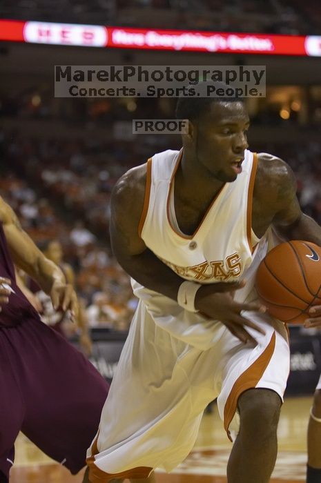 Forward Damion James, #5.  The longhorns defeated the Texas Southern University (TSU) Tigers 90-50 Tuesday night.

Filename: SRM_20061128_2022364.jpg
Aperture: f/2.8
Shutter Speed: 1/640
Body: Canon EOS-1D Mark II
Lens: Canon EF 80-200mm f/2.8 L