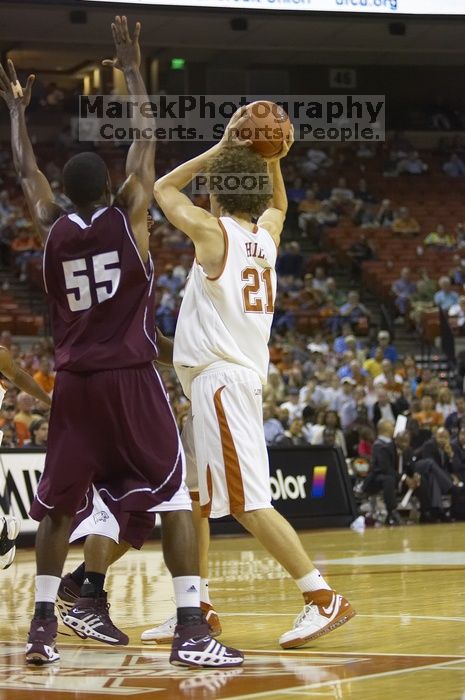 Matt Hill, #21.  The longhorns defeated the Texas Southern University (TSU) Tigers 90-50 Tuesday night.

Filename: SRM_20061128_2027068.jpg
Aperture: f/2.8
Shutter Speed: 1/640
Body: Canon EOS-1D Mark II
Lens: Canon EF 80-200mm f/2.8 L