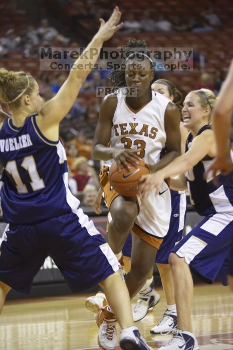 Forward Tiffany Jackson, #33.  The lady longhorns defeated the Oral Roberts University's (ORU) Golden Eagles 79-40 Saturday night.

Filename: SRM_20061125_1324583.jpg
Aperture: f/2.8
Shutter Speed: 1/400
Body: Canon EOS-1D Mark II
Lens: Canon EF 80-200mm f/2.8 L