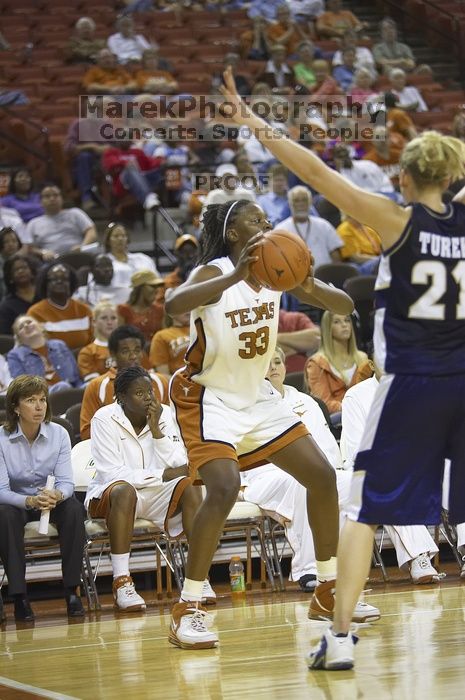 Forward Tiffany Jackson, #33.  The lady longhorns defeated the Oral Roberts University's (ORU) Golden Eagles 79-40 Saturday night.

Filename: SRM_20061125_1327066.jpg
Aperture: f/2.8
Shutter Speed: 1/400
Body: Canon EOS-1D Mark II
Lens: Canon EF 80-200mm f/2.8 L