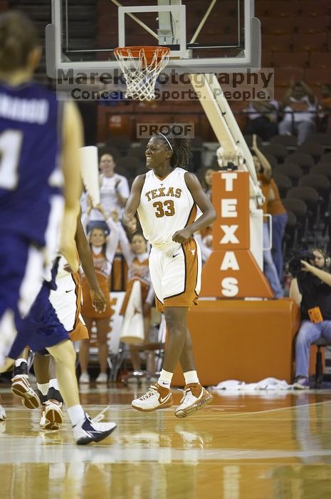 Forward Tiffany Jackson, #33.  The lady longhorns defeated the Oral Roberts University's (ORU) Golden Eagles 79-40 Saturday night.

Filename: SRM_20061125_1351148.jpg
Aperture: f/2.8
Shutter Speed: 1/400
Body: Canon EOS-1D Mark II
Lens: Canon EF 80-200mm f/2.8 L