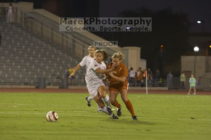 The lady longhorns beat Texas A&M 1-0 in soccer Friday night.

Filename: SRM_20061027_1911427.jpg
Aperture: f/4.0
Shutter Speed: 1/500
Body: Canon EOS 20D
Lens: Canon EF 80-200mm f/2.8 L