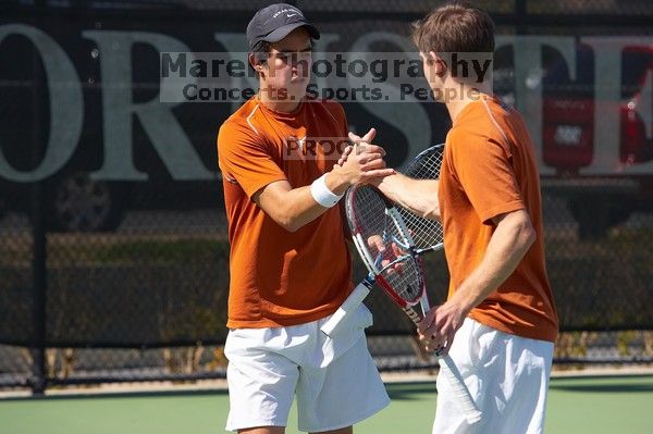 Luis Diaz Barriga and Bernhard Deussner.  The University of Texas (UT) men's tennis team defeated Georgia Tech (GT) Saturday, February 24, 2007..

Filename: SRM_20070224_1349323.jpg
Aperture: f/5.0
Shutter Speed: 1/2500
Body: Canon EOS-1D Mark II
Lens: Canon EF 80-200mm f/2.8 L