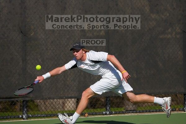 Rook Schellenberg (UT) defeated George Gvelesiani (GT) 6-3, 7-6.  The University of Texas (UT) men's tennis team defeated Georgia Tech (GT) Saturday, February 24, 2007..

Filename: SRM_20070224_1510266.jpg
Aperture: f/4.0
Shutter Speed: 1/4000
Body: Canon EOS-1D Mark II
Lens: Canon EF 80-200mm f/2.8 L