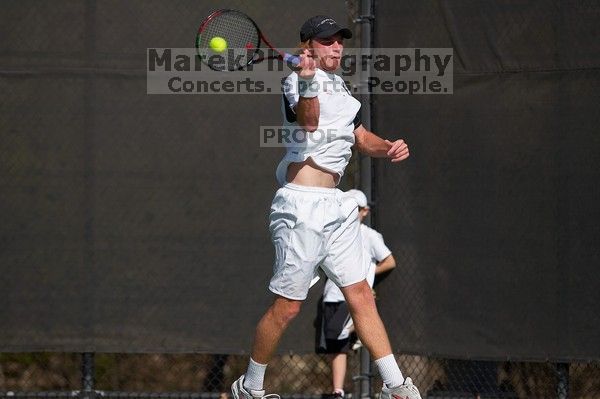 Rook Schellenberg (UT) defeated George Gvelesiani (GT) 6-3, 7-6.  The University of Texas (UT) men's tennis team defeated Georgia Tech (GT) Saturday, February 24, 2007..

Filename: SRM_20070224_1511443.jpg
Aperture: f/4.0
Shutter Speed: 1/4000
Body: Canon EOS-1D Mark II
Lens: Canon EF 80-200mm f/2.8 L