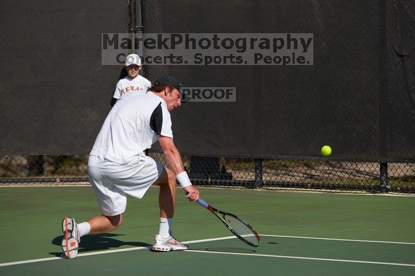 Rook Schellenberg (UT) defeated George Gvelesiani (GT) 6-3, 7-6.  The University of Texas (UT) men's tennis team defeated Georgia Tech (GT) Saturday, February 24, 2007..

Filename: SRM_20070224_1514184.jpg
Aperture: f/4.0
Shutter Speed: 1/4000
Body: Canon EOS-1D Mark II
Lens: Canon EF 80-200mm f/2.8 L