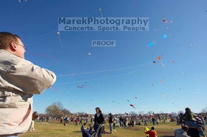 Former UT student Jeff Greenwell attempts to fly a kite at the 79th annual Zilker Park Kite Festival, Sunday, March 4, 2007.

Filename: SRM_20070304_1535163.jpg
Aperture: f/11.0
Shutter Speed: 1/250
Body: Canon EOS-1D Mark II
Lens: Sigma 15-30mm f/3.5-4.5 EX Aspherical DG DF