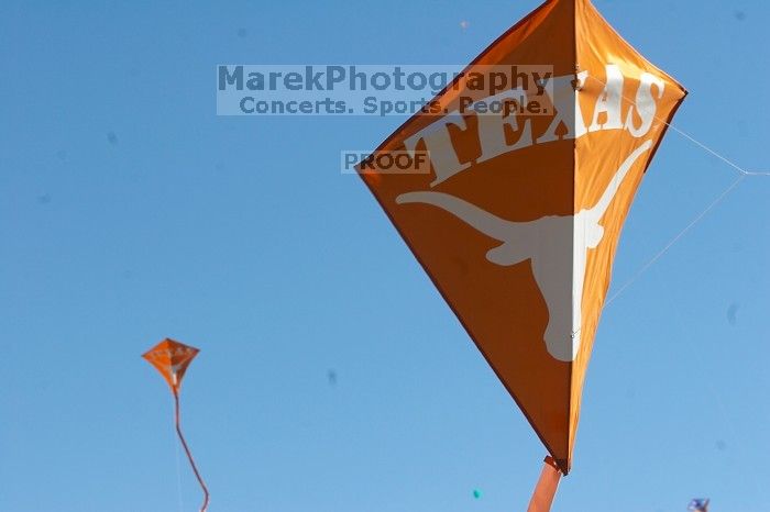 UT kites at the 79th annual Zilker Park Kite Festival, Sunday, March 4, 2007.

Filename: SRM_20070304_1541085.jpg
Aperture: f/11.0
Shutter Speed: 1/500
Body: Canon EOS 20D
Lens: Canon EF 80-200mm f/2.8 L