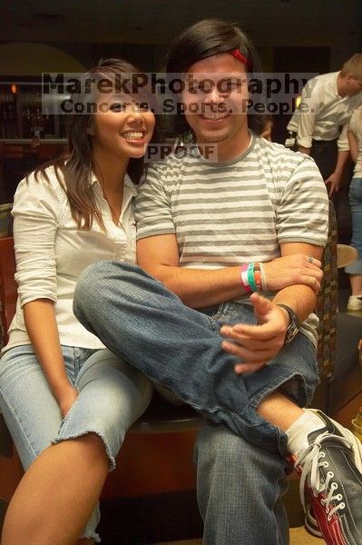 Christine Nguyen and Will Weaver.  Alpha Xi Delta held a sock hop themed date night at the Austin 300 bowling alley, Thursday night, March 29, 2007.

Filename: SRM_20070329_2046289.jpg
Aperture: f/8.0
Shutter Speed: 1/200
Body: Canon EOS-1D Mark II
Lens: Sigma 15-30mm f/3.5-4.5 EX Aspherical DG DF