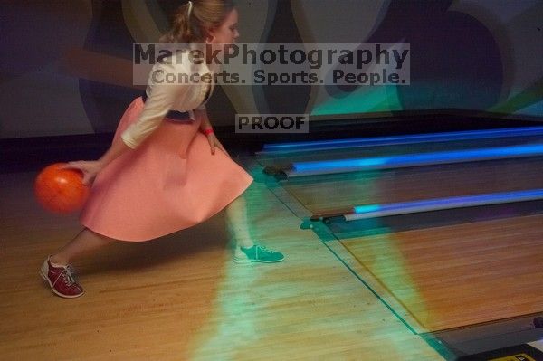 Carol Gossett bowling.  Alpha Xi Delta held a sock hop themed date night at the Austin 300 bowling alley, Thursday night, March 29, 2007.

Filename: SRM_20070329_2118263.jpg
Aperture: f/7.1
Shutter Speed: 1/1
Body: Canon EOS-1D Mark II
Lens: Sigma 15-30mm f/3.5-4.5 EX Aspherical DG DF