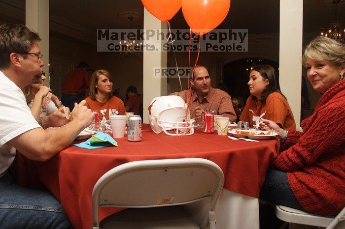 Emily Kleine and her parents, left, enjoy lunch with Liz Colquitt and her parents.  Kappa Kappa Gamma (KKG) hosted a parents' weekend barbecue before the UT vs Nebraska football game on Saturday, October 27, 2007 at their sorority house.

Filename: SRM_20071027_1143406.jpg
Aperture: f/8.0
Shutter Speed: 1/250
Body: Canon EOS 20D
Lens: Canon EF-S 18-55mm f/3.5-5.6