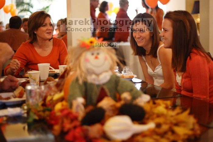 Hannah Koeijmans (in white), Madeline Koeijmans (in red), Grace Koeijmans (in brown and orange) and their parents. Kappa Kappa Gamma (KKG) hosted a parents' weekend barbecue before the UT vs Nebraska football game on Saturday, October 27, 2007 at their so
Filename: SRM_20071027_1148287.jpg
Aperture: f/1.8
Shutter Speed: 1/50
Body: Canon EOS-1D Mark II
Lens: Canon EF 50mm f/1.8 II