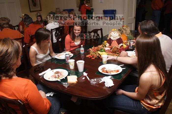 Hannah Koeijmans (in white), Madeline Koeijmans (in red), Grace Koeijmans (in brown and orange) and their parents.  Kappa Kappa Gamma (KKG) hosted a parents' weekend barbecue before the UT vs Nebraska football game on Saturday, October 27, 2007 at their so

Filename: SRM_20071027_1153004.jpg
Aperture: f/8.0
Shutter Speed: 1/250
Body: Canon EOS 20D
Lens: Canon EF-S 18-55mm f/3.5-5.6