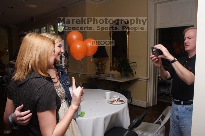 Brooks Dennard stops to pose for some photos. Kappa Kappa Gamma (KKG) hosted a parents' weekend barbecue before the UT vs Nebraska football game on Saturday, October 27, 2007 at their sorority house.
Filename: SRM_20071027_1157381.jpg
Aperture: f/8.0
Shutter Speed: 1/250
Body: Canon EOS 20D
Lens: Canon EF-S 18-55mm f/3.5-5.6