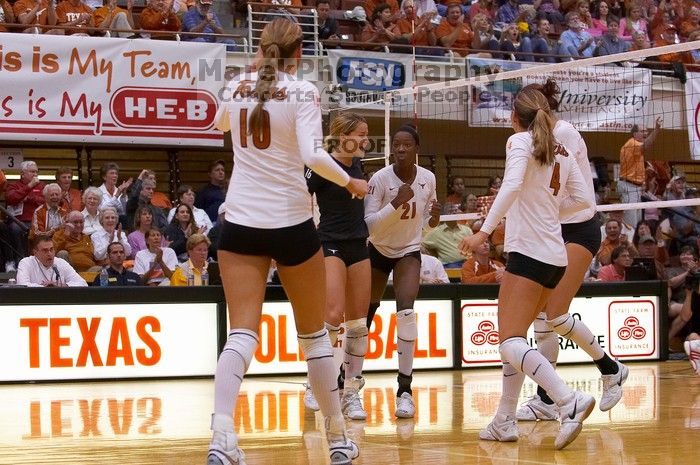 UT sophomore Ashley Engle (#10, S/RS), UT senior Alyson Jennings (#16, L), UT sophomore Destinee Hooker (#21, OH), UT senior Michelle Moriarty (#4, S) and UT freshman Juliann Faucette (#1, OH) celebrate after a point. The Longhorns defeated the Huskers 3-
Filename: SRM_20071024_1902344.jpg
Aperture: f/4.0
Shutter Speed: 1/400
Body: Canon EOS-1D Mark II
Lens: Canon EF 80-200mm f/2.8 L