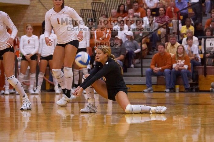 UT senior Alyson Jennings (#16, L) waits for the ball as UT freshman Juliann Faucette (#1, OH) watches, with UT freshman Chelsey Klein (#9, DS) and UT junior Lauren Paolini (#3, UTIL) watching from the sideline.  The Longhorns defeated the Huskers 3-0 on W

Filename: SRM_20071024_1913047.jpg
Aperture: f/4.0
Shutter Speed: 1/400
Body: Canon EOS-1D Mark II
Lens: Canon EF 80-200mm f/2.8 L