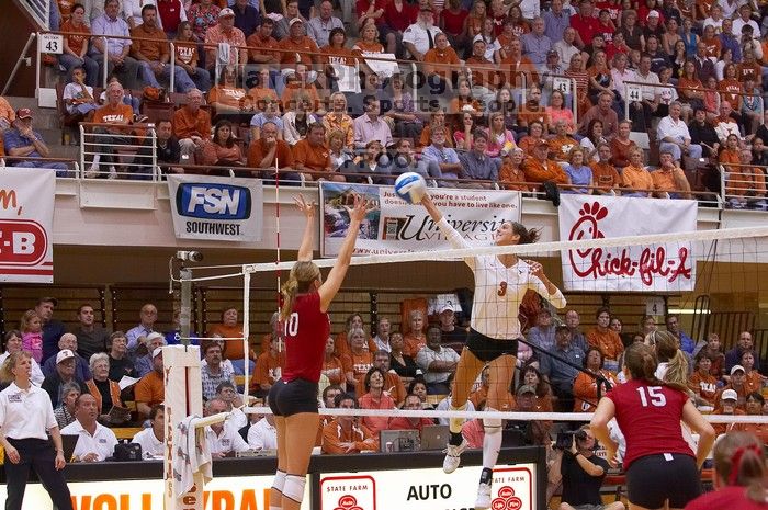 UT junior Lauren Paolini (#3, UTIL) spikes the ball as Nebraska junior Jordan Larson (#10, OH) attempts to block it and Nebraska sophomore Kori Cooper (#15, MB) watches.  The Longhorns defeated the Huskers 3-0 on Wednesday night, October 24, 2007 at Gregor

Filename: SRM_20071024_1924383.jpg
Aperture: f/4.0
Shutter Speed: 1/400
Body: Canon EOS-1D Mark II
Lens: Canon EF 80-200mm f/2.8 L