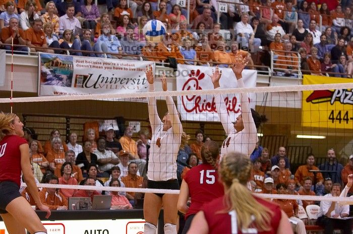 UT senior Michelle Moriarty (#4, S) and UT senior Brandy Magee (#44, MB) block a spike by Nebraska junior Jordan Larson (#10, OH) as Nebraska sophomore Kori Cooper (#15, MB) and Nebraska sophomore Rachel Holloway (#12, S) watch.  The Longhorns defeated the

Filename: SRM_20071024_1926105.jpg
Aperture: f/4.0
Shutter Speed: 1/400
Body: Canon EOS-1D Mark II
Lens: Canon EF 80-200mm f/2.8 L