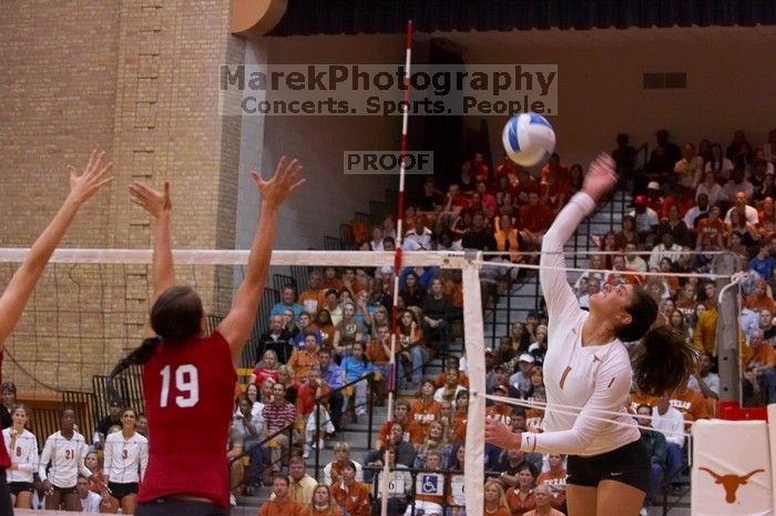 UT freshman Juliann Faucette (#1, OH) spikes as Nebraska freshman Tara Mueller (#19, OH) attempts to block.  The Longhorns defeated the Huskers 3-0 on Wednesday night, October 24, 2007 at Gregory Gym.

Filename: SRM_20071024_1927080.jpg
Aperture: f/4.0
Shutter Speed: 1/400
Body: Canon EOS-1D Mark II
Lens: Canon EF 80-200mm f/2.8 L