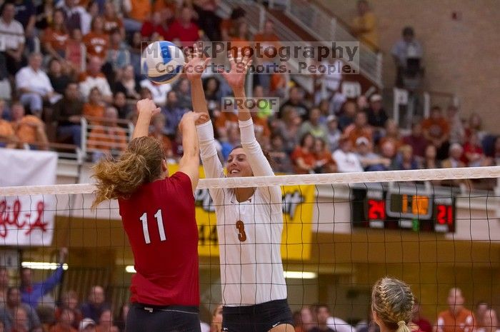 UT junior Lauren Paolini (#3, UTIL) blocks a hit by Nebraska senior Tracy Stalls (#11, MB).  The Longhorns defeated the Huskers 3-0 on Wednesday night, October 24, 2007 at Gregory Gym.

Filename: SRM_20071024_1931585.jpg
Aperture: f/4.0
Shutter Speed: 1/400
Body: Canon EOS-1D Mark II
Lens: Canon EF 80-200mm f/2.8 L