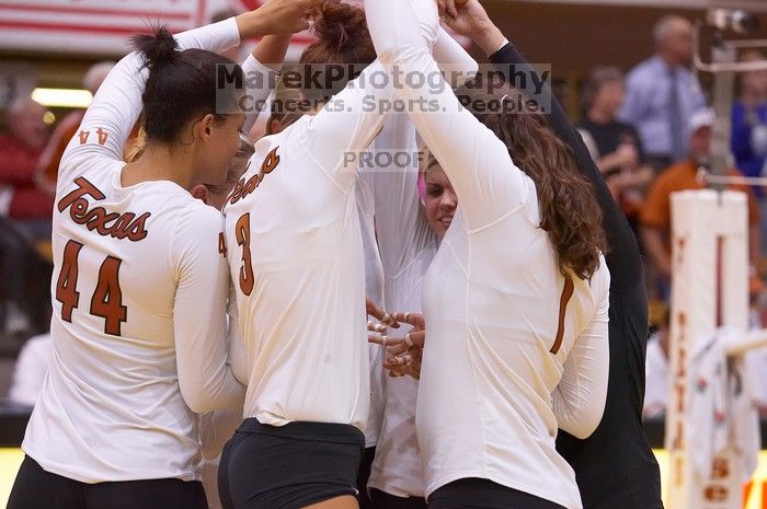 UT senior Brandy Magee (#44, MB), UT junior Lauren Paolini (#3, UTIL), UT sophomore Ashley Engle (#10, S/RS), UT freshman Juliann Faucette (#1, OH) and UT senior Alyson Jennings (#16, L) prepare for the third game.  The Longhorns defeated the Huskers 3-0 o

Filename: SRM_20071024_1948288.jpg
Aperture: f/4.0
Shutter Speed: 1/320
Body: Canon EOS-1D Mark II
Lens: Canon EF 80-200mm f/2.8 L