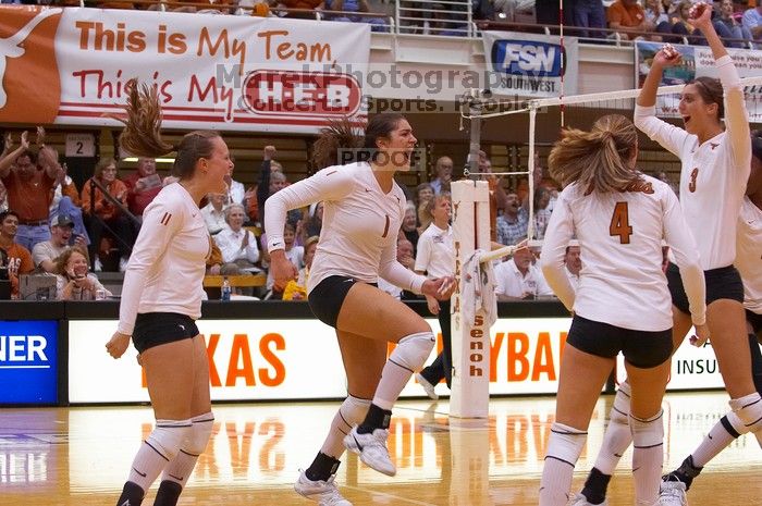 UT junior Kiley Hall (#11, DS/L), UT freshman Juliann Faucette (#1, OH), UT senior Michelle Moriarty (#4, S) and UT junior Lauren Paolini (#3, UTIL) are ecstatic after a point. The Longhorns defeated the Huskers 3-0 on Wednesday night, October 24, 2007 at
Filename: SRM_20071024_1954521.jpg
Aperture: f/4.0
Shutter Speed: 1/400
Body: Canon EOS-1D Mark II
Lens: Canon EF 80-200mm f/2.8 L