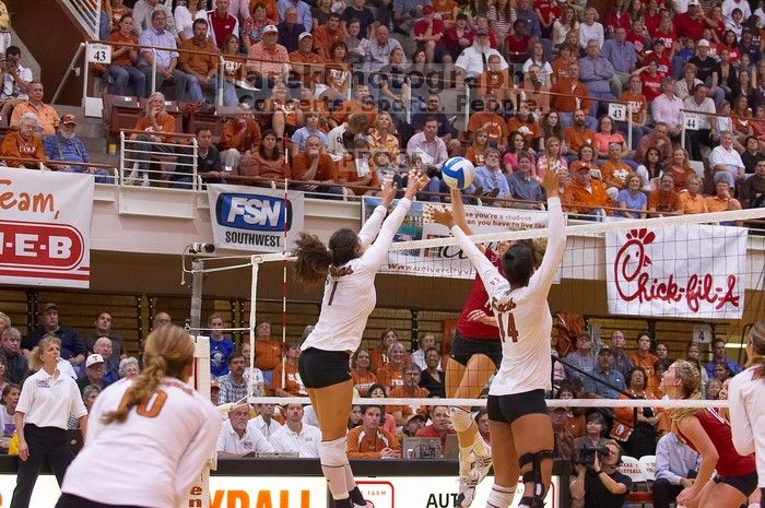 UT freshman Juliann Faucette (#1, OH) and UT senior Brandy Magee (#44, MB) attempt to block a hit by Nebraska senior Tracy Stalls (#11, MB) as UT sophomore Ashley Engle (#10, S/RS) and UT senior Michelle Moriarty (#4, S) watch.  The Longhorns defeated the

Filename: SRM_20071024_2002525.jpg
Aperture: f/4.0
Shutter Speed: 1/320
Body: Canon EOS-1D Mark II
Lens: Canon EF 80-200mm f/2.8 L