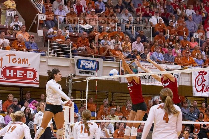 UT freshman Juliann Faucette (#1, OH) hits the ball past blockers Nebraska senior Sarah Pavan (#9, RS) and Nebraska sophomore Kori Cooper (#15, MB) as UT sophomore Heather Kisner (#19, DS), UT sophomore Ashley Engle (#10, S/RS) and UT senior Michelle Moria

Filename: SRM_20071024_2004464.jpg
Aperture: f/4.0
Shutter Speed: 1/320
Body: Canon EOS-1D Mark II
Lens: Canon EF 80-200mm f/2.8 L