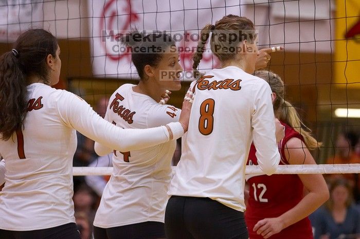 UT freshman Juliann Faucette (#1, OH), UT senior Brandy Magee (#44, MB) and UT freshman Jennifer Doris (#8, UTIL) wait at the net for the action to begin.  The Longhorns defeated the Huskers 3-0 on Wednesday night, October 24, 2007 at Gregory Gym.

Filename: SRM_20071024_2010189.jpg
Aperture: f/4.0
Shutter Speed: 1/400
Body: Canon EOS-1D Mark II
Lens: Canon EF 80-200mm f/2.8 L