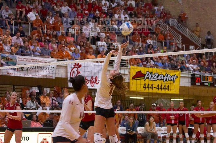 UT senior Michelle Moriarty (#4, S) sets the ball for UT senior Brandy Magee (#44, MB).  The Longhorns defeated the Huskers 3-0 on Wednesday night, October 24, 2007 at Gregory Gym.

Filename: SRM_20071024_2011262.jpg
Aperture: f/4.0
Shutter Speed: 1/400
Body: Canon EOS-1D Mark II
Lens: Canon EF 80-200mm f/2.8 L