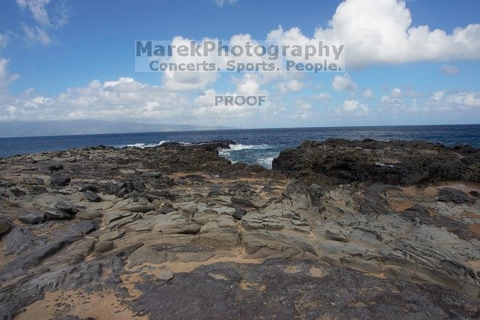 Hike to the Nakalele blowholes along the surf-beaten lava formations.

Filename: SRM_20071219_1220052.jpg
Aperture: f/10.0
Shutter Speed: 1/800
Body: Canon EOS-1D Mark II
Lens: Sigma 15-30mm f/3.5-4.5 EX Aspherical DG DF