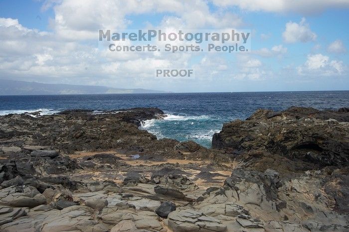 Hike to the Nakalele blowholes along the surf-beaten lava formations.

Filename: SRM_20071219_1220203.jpg
Aperture: f/10.0
Shutter Speed: 1/640
Body: Canon EOS-1D Mark II
Lens: Sigma 15-30mm f/3.5-4.5 EX Aspherical DG DF