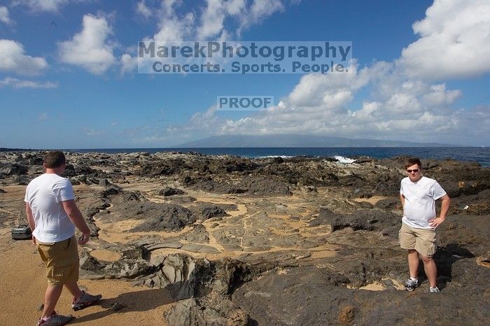 Daniel Carr and Justin Shofner.  Hike to the Nakalele blowholes along the surf-beaten lava formations.

Filename: SRM_20071219_1222128.jpg
Aperture: f/10.0
Shutter Speed: 1/1250
Body: Canon EOS-1D Mark II
Lens: Sigma 15-30mm f/3.5-4.5 EX Aspherical DG DF