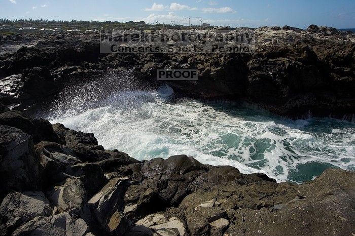 Hike to the Nakalele blowholes along the surf-beaten lava formations.

Filename: SRM_20071219_1224374.jpg
Aperture: f/8.0
Shutter Speed: 1/4000
Body: Canon EOS-1D Mark II
Lens: Sigma 15-30mm f/3.5-4.5 EX Aspherical DG DF