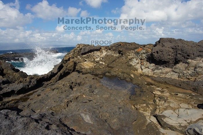 Hike to the Nakalele blowholes along the surf-beaten lava formations.

Filename: SRM_20071219_1226303.jpg
Aperture: f/8.0
Shutter Speed: 1/3200
Body: Canon EOS-1D Mark II
Lens: Sigma 15-30mm f/3.5-4.5 EX Aspherical DG DF