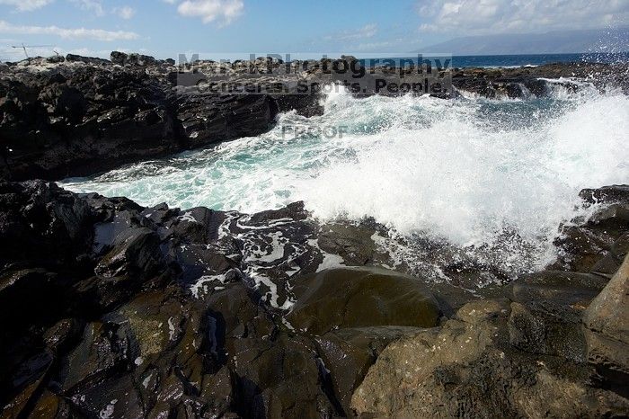 Hike to the Nakalele blowholes along the surf-beaten lava formations.

Filename: SRM_20071219_1227320.jpg
Aperture: f/8.0
Shutter Speed: 1/3200
Body: Canon EOS-1D Mark II
Lens: Sigma 15-30mm f/3.5-4.5 EX Aspherical DG DF