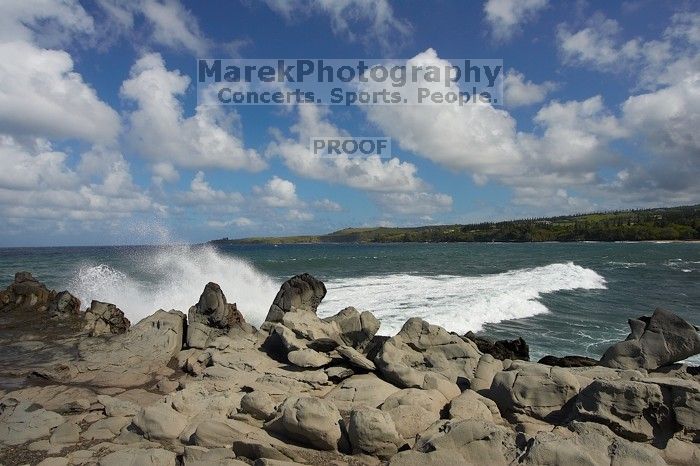 Hike to the Nakalele blowholes along the surf-beaten lava formations.

Filename: SRM_20071219_1234548.jpg
Aperture: f/8.0
Shutter Speed: 1/5000
Body: Canon EOS-1D Mark II
Lens: Sigma 15-30mm f/3.5-4.5 EX Aspherical DG DF